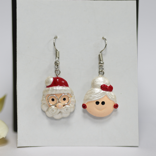 Santa Claus earrings on a white background